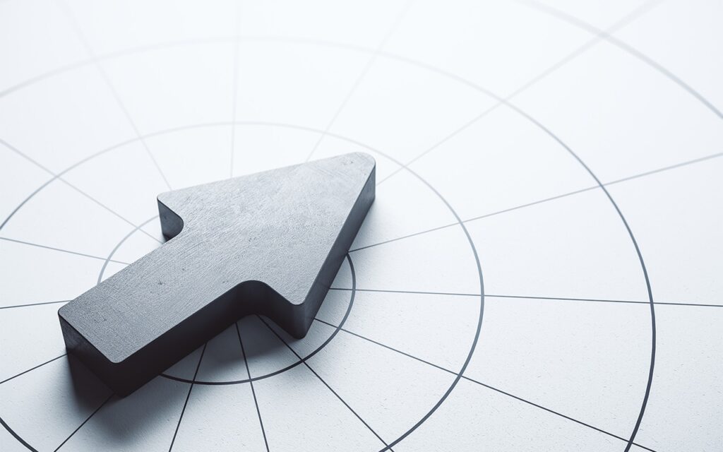 flecha-de-metal-sobre-mesa-gris-expansión en Latinoamérica