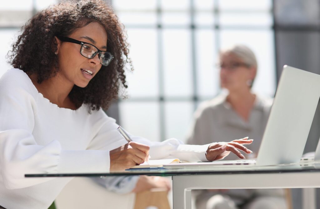 young-attractive-african-american-woman-office-scaled-e1770198810867